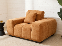Load image into Gallery viewer, Felipe modern lounge chair in warm terracotta textured upholstery with deep channel-tufted seat, oversized padded arms, rounded silhouette, and coordinating cushions
