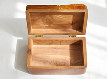 Load image into Gallery viewer, An open wooden keepsake box with a natural wood grain finish and brass hinges, photographed on a white background with soft shadows.
