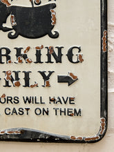 Load image into Gallery viewer, A close-up of a vintage distressed metal sign with black raised lettering on an off-white background, showing part of a black boot graphic and weathered brown rust around the edges.
