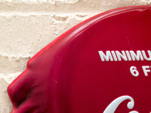 Load image into Gallery viewer, A close-up of a red metal wall sign with white lettering that reads 'MINIMUM 6 F.
