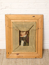 Load image into Gallery viewer, A rustic vintage-style framed art piece featuring a painted portrait of a young man inside a light wood frame with a linen fabric cover.
