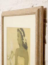 Load image into Gallery viewer, Vintage framed portrait of a Hawaiian hula dancer with floral hair adornment and tropical foliage in muted green and cream tones

