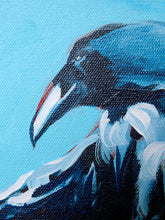 Load image into Gallery viewer, Close-up of a painted raven or crow in profile on a bright blue background, with visible canvas texture and brushstrokes in black, white, blue, and a small red accent near the beak.
