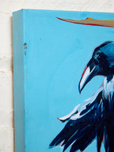 Load image into Gallery viewer, A close-up of a canvas painting showing a raven or crow in profile against a bright turquoise background, mounted on a white textured wall.

