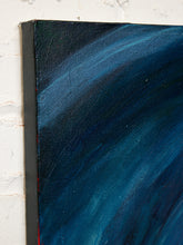 Load image into Gallery viewer, Image 4 of 8: Close-up of a textured canvas painting showing deep blue and black abstract brushstrokes, mounted on a white brick wall.
