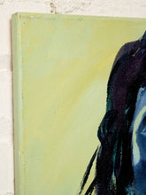 Load image into Gallery viewer, A close-up of a canvas painting showing a pale yellow-green background with dark navy, black, and blue painted brushstrokes on the right side, mounted against a white brick wall.
