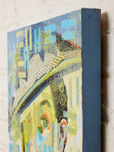 Load image into Gallery viewer, A close-up of a textured canvas painting showing a stylized face with blue, yellow, green, and black brushstrokes, mounted on a white brick wall.
