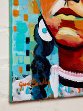 Load image into Gallery viewer, A close-up of a colorful painted canvas featuring an abstract portrait with turquoise, red, black, white, and orange brushstrokes. The artist's signature 'Jim Baldwin' is visible near the bottom left.
