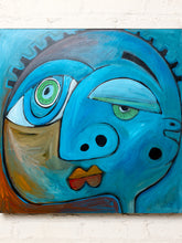 Load image into Gallery viewer, A colorful abstract painting of a stylized face in shades of blue, green, brown, and orange, displayed on a white brick wall.
