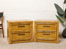 Load image into Gallery viewer, Image 1 of 21: Vintage honey oak nightstand featuring two drawers, natural wood grain, rounded faux-bamboo trim, and antique brass-tone horizontal handles, available as a pair.
