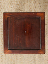 Load image into Gallery viewer, Image 7 of 16: A square dark brown wooden box or cabinet lid with a raised border, photographed from above on a textured beige woven surface.
