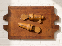 Load image into Gallery viewer, Image 1 of 9: Antique rectangular wooden mold featuring a warm reddish-brown finish, visible wood grain, two raised carved forms with lettering, aged surface markings, and notched edges.
