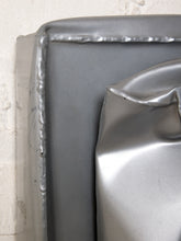 Load image into Gallery viewer, Image 8 of 13: Vintage abstract wall sculpture featuring a crumpled silver-tone metallic form with deep folds and sculptural creases, mounted on a square silver backing with raised decorative edges.
