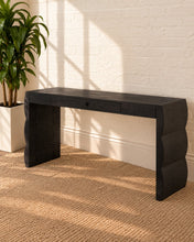 Load image into Gallery viewer, Sydney charcoal acacia wood desk with one center drawer, sculptural curved waterfall sides, and a streamlined rectangular top.

