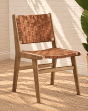 Load image into Gallery viewer, Sylas dining chair with rich mocha basket-weave leather seat and backrest, warm rubberwood frame, and tapered legs
