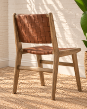 Load image into Gallery viewer, Sylas dining chair with rich mocha basket-weave leather seat and backrest, warm rubberwood frame, and tapered legs
