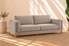 Load image into Gallery viewer, Talia stone gray mélange chenille sofa with deep cushions, layered upholstered arms, and natural wood base
