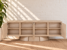 Load image into Gallery viewer, Image 4 of 5: Thera 4-Door Buffet Credenza in Blonde Oak with sculptural curved base and Art Deco detailing
