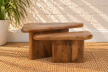 Load image into Gallery viewer, Thomy two-piece natural brown mango wood coffee table with overlapping organic tops, rounded edges, and sculptural panel bases.
