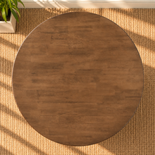 Load image into Gallery viewer, Image 3 of 4: Tori 47-inch round dining table in Natural Walnut with sculptural cross base and rounded tabletop edge
