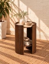 Load image into Gallery viewer, Tucker travertine top side table in Natural Brown with beige travertine and curved walnut-finished mango wood frame
