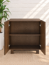 Load image into Gallery viewer, Veda dark oak bar cabinet with vertical striped oak and walnut veneer doors and raised wood base
