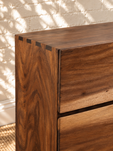 Load image into Gallery viewer, Image 4 of 4: Velez 6-Drawer Mahogany Dresser in Natural Walnut with live edge-style wood grain drawer fronts and floating base
