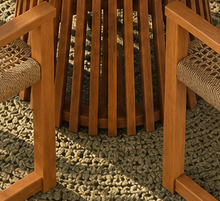 Load image into Gallery viewer, Victoria warm teak outdoor dining set with round slatted pedestal table and four woven faux rattan armchairs
