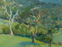 Load image into Gallery viewer, Original Felice Hrovat landscape painting with rolling green hills, mature trees and deep blue mountains in an ornate gold-tone frame.
