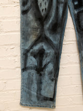 Load image into Gallery viewer, Cesar Platero hand-painted blue denim jeans with large black and gray abstract shapes, circles, lines, and expressive graphic artwork.
