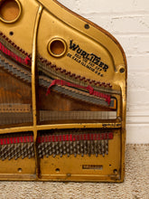 Load image into Gallery viewer, Deconstructed piano harp with gold-tone cast metal frame, exposed strings, tuning pins, red felt, and aged patina

