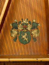 Load image into Gallery viewer, Deconstructed piano harp with gold-tone cast metal frame, exposed strings, tuning pins, red felt, and aged patina

