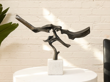 Load image into Gallery viewer, Rivulet abstract bronze sculpture with flowing organic openwork form and dark patina mounted on a square white stone base
