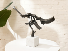 Load image into Gallery viewer, Rivulet abstract bronze sculpture with flowing organic openwork form and dark patina mounted on a square white stone base
