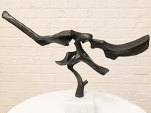 Load image into Gallery viewer, Rivulet abstract bronze sculpture with flowing organic openwork form and dark patina mounted on a square white stone base
