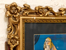 Load image into Gallery viewer, Art Deco-style portrait of woman in red gown with feather fan and pearls in an ornate gold-tone floral frame with black mat
