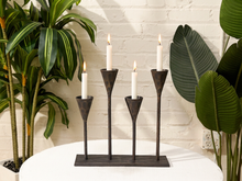 Load image into Gallery viewer, Vintage primitive cast iron candle holder with four tall flared candle cups on rectangular base

