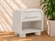 Load image into Gallery viewer, Vivienne one drawer nightstand in Soft White with curved frame, open lower shelf, elongated handle, and rounded feet

