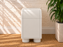 Load image into Gallery viewer, Vivienne one drawer nightstand in Soft White with curved frame, open lower shelf, elongated handle, and rounded feet

