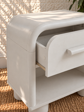 Load image into Gallery viewer, Vivienne one drawer nightstand in Soft White with curved frame, open lower shelf, elongated handle, and rounded feet

