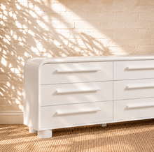 Load image into Gallery viewer, Vivienne six drawer dresser in soft white with rounded frame, long matching handles, and rounded feet
