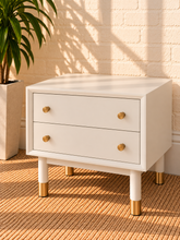 Load image into Gallery viewer, Image 3 of 4: Yvette 2-drawer side table in Chalk White with polished gold details and elevated legs
