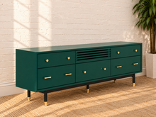 Load image into Gallery viewer, Image 3 of 4: Yvette Low TV Stand in Juniper Green with five drawers, flip-down media compartment, gold details, and elevated legs
