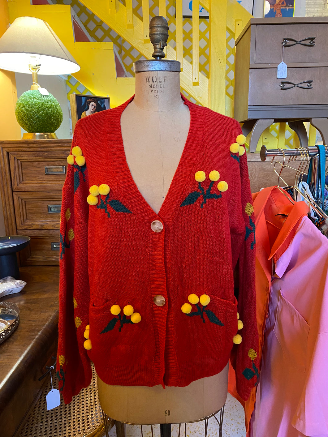 Red Sweater with Yellow Pom Pom Flowers