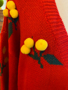 Red Sweater with Yellow Pom Pom Flowers