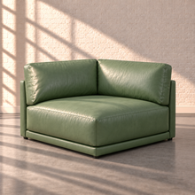 Load image into Gallery viewer, Image 13 of 18: Simulated Orinda individual square corner module in sage green Sequoia Rainforest leather, without accent pillows, in the Sunbeam white brick setting.
