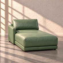 Load image into Gallery viewer, Image 11 of 18: Simulated Orinda individual left-arm chaise module in sage green Sequoia Rainforest leather, without accent pillows, in the Sunbeam white brick setting.
