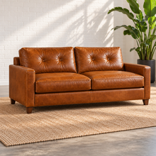 Load image into Gallery viewer, Image 2 of 3: Solano 82-inch sofa in Sequoia Fawn caramel leather with two seat cushions, two tufted backs, slim arms and walnut legs.

