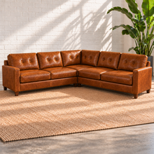 Load image into Gallery viewer, Image 3 of 13: Solano three-piece square-corner sectional simulation in distressed Sequoia Fawn leather, with tufted backs and walnut legs.

