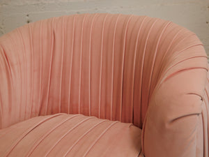 Pink pleated club chair